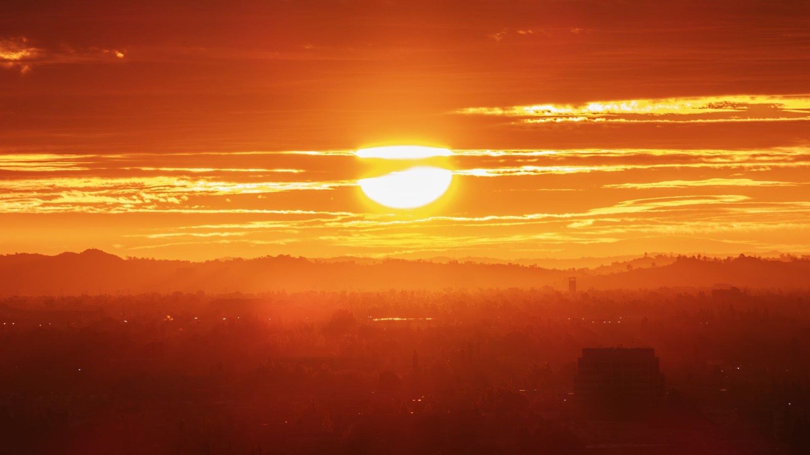 A photo of a blazing sunrise over Los Angeles.