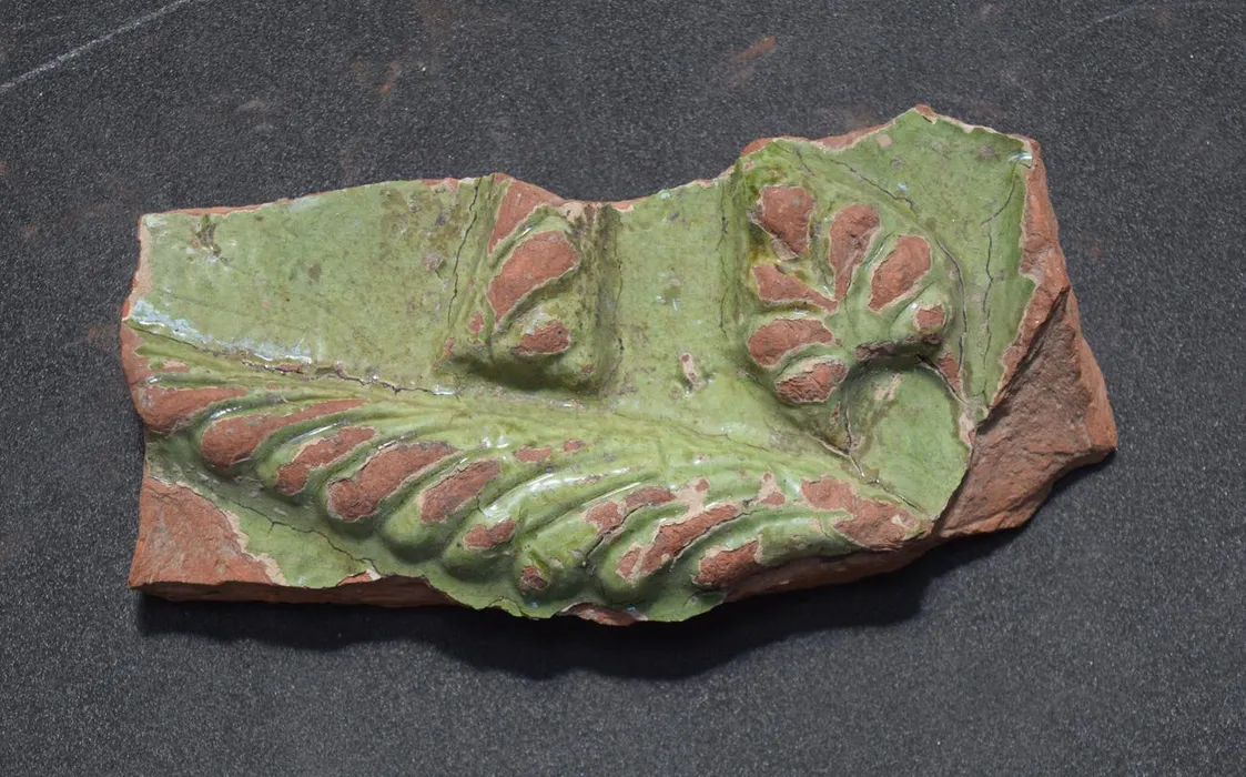Dish (sherd.); red pottery (earthenware) covered with white slip and gree glaze. - Bilinmiyor
