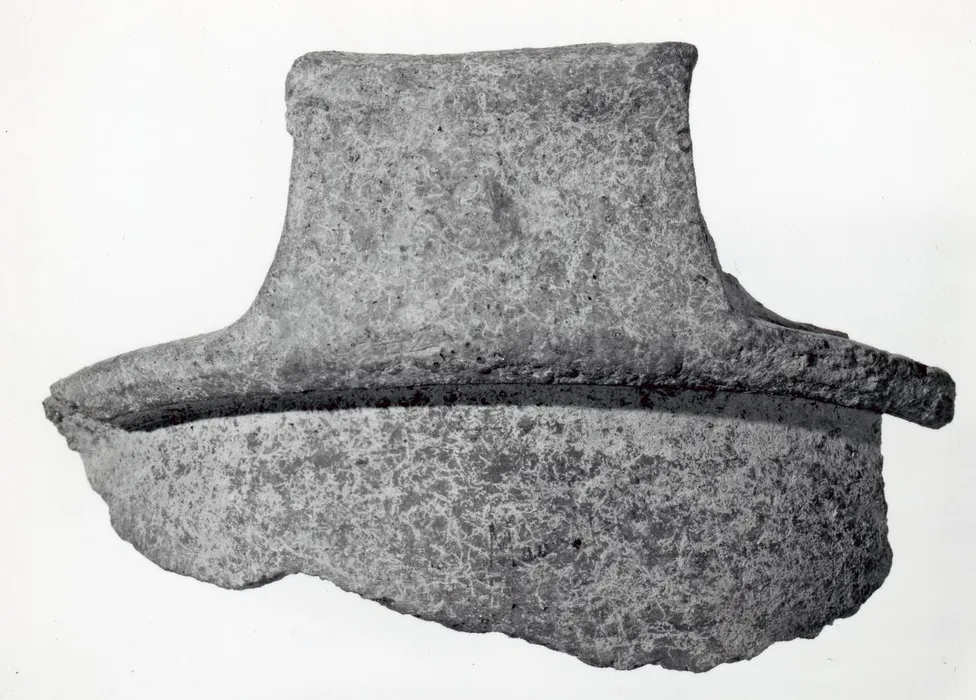 Terracotta brazier fragment; handle and portion of rim; plain support. - Bilinmiyor